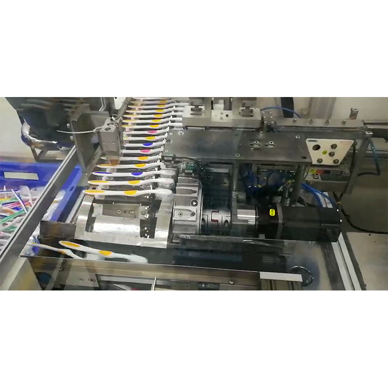 Toothbrush packing machine