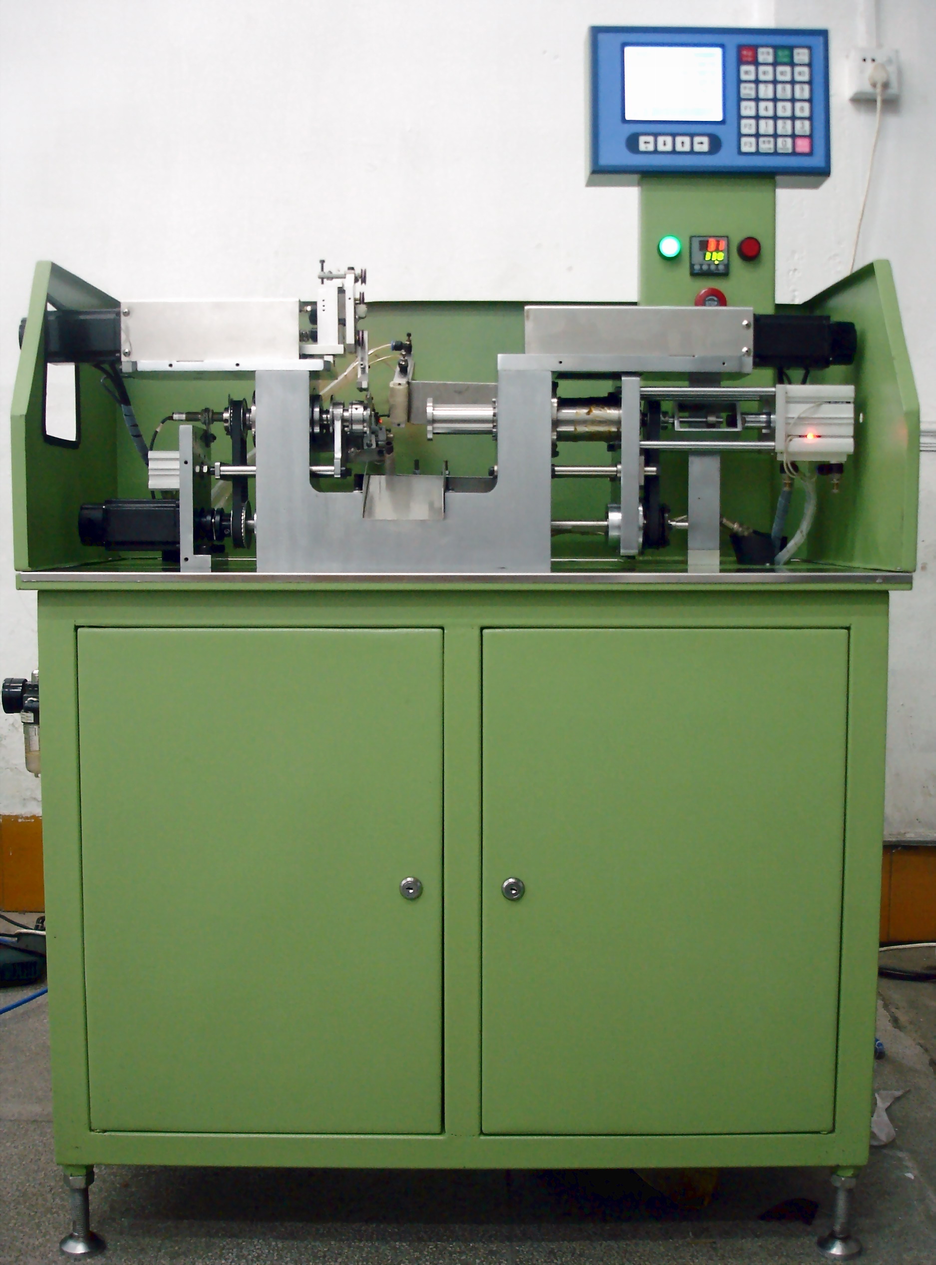 Coil winding machine for coils